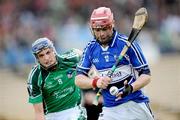 18 July 2009; Owen Holohan, Laois, in action against Gavin O'Mahoney, Limerick. GAA All-Ireland Senior Hurling Championship, Phase 3, Laois v Limerick, Semple Stadium, Thurles, Co. Tipperary. Picture credit: Brian Lawless / SPORTSFILE