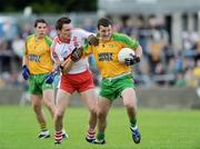 18 July 2009; Michael Murphy, Donegal, in action against James Kielt, Derry. GAA All-Ireland Senior Football Championship Qualifier, Round 3, Donegal v Derry, MacCumhaill Park, Ballybofey, Co. Donegal. Picture credit: Oliver McVeigh / SPORTSFILE