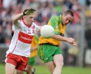 18 July 2009; Brendan Boyle, Donegal, in action against Seamus Bradley, Derry. GAA All-Ireland Senior Football Championship Qualifier, Round 3, Donegal v Derry, MacCumhaill Park, Ballybofey, Co. Donegal. Picture credit: Oliver McVeigh / SPORTSFILE