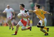 19 July 2009; Martin Penrose, Tyrone, in action against Kevin O'Boyle, Antrim. GAA Football Ulster Senior Championship Final, Tyrone v Antrim, St Tighearnach's Park, Clones, Co. Monaghan. Picture credit: Brian Lawless / SPORTSFILE