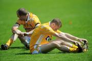 19 July 2009; Antrim's Paddy Cunningham and Aodhan Gallagher, left, show their disappointment after the match. GAA Football Ulster Senior Championship Final, Tyrone v Antrim, St Tighearnach's Park, Clones, Co. Monaghan. Picture credit: Brian Lawless / SPORTSFILE