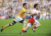 19 July 2009; Martin Penrose, Tyrone, in action against Kevin O'Boyle, Antrim. GAA Football Ulster Senior Championship Final, Tyrone v Antrim, St Tighearnach's Park, Clones, Co. Monaghan. Picture credit: Oliver McVeigh / SPORTSFILE