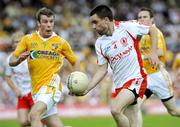 19 July 2009; Ryan McMenamin, Tyrone, in action against James Loughrey, Antrim. GAA Football Ulster Senior Championship Final, Tyrone v Antrim, St Tighearnach's Park, Clones, Co. Monaghan. Picture credit: Michael Cullen / SPORTSFILE