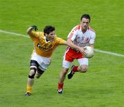 19 July 2009; Martin Penrose, Tyrone, in action against Kevin O'Boyle, Antrim. GAA Football Ulster Senior Championship Final, Tyrone v Antrim, St Tighearnach's Park, Clones, Co. Monaghan. Picture credit: Michael Cullen / SPORTSFILE