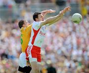 19 July 2009; Conor Gormley, Tyrone, in action against Justin Crozier, Antrim. GAA Football Ulster Senior Championship Final, Tyrone v Antrim, St Tighearnach's Park, Clones, Co. Monaghan. Picture credit: Brian Lawless / SPORTSFILE