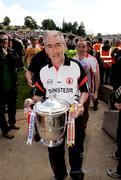 19 July 2009; Tyrone manager Mickey Harte with the Anglo Celt cup. GAA Football Ulster Senior Championship Final, Tyrone v Antrim, St Tighearnach's Park, Clones, Co. Monaghan. Picture credit: Oliver McVeigh / SPORTSFILE