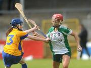 18 July 2009; Aoifa Sheehan, Limerick, in action against Kate Lynch, Clare. Gala Senior Camogie Championship, Group 2, Round 3, Clare v Limerick, Cusack Park, Ennis, Co. Clare. Picture credit: Diarmuid Greene / SPORTSFILE