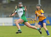 18 July 2009; Sarah Carey, daughter of former Limerick hurler Ciaran Carey, Limerick, in action against Shonagh Enright, Clare. Gala Senior Camogie Championship, Group 2, Round 3, Clare v Limerick, Cusack Park, Ennis, Co. Clare. Picture credit: Diarmuid Greene / SPORTSFILE