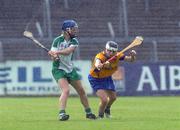 18 July 2009; Catriona Davis, Limerick, in action against Sarah Sherlock, Clare. Gala Senior Camogie Championship, Group 2, Round 3, Clare v Limerick, Cusack Park, Ennis, Co. Clare. Picture credit: Diarmuid Greene / SPORTSFILE