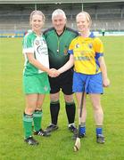 18 July 2009; Clare captain Deirdre Murphy and Limerick captain Deirdre Fitzpatrick shake hands in front of referee Eamonn Browne before the game. Gala Senior Camogie Championship, Group 2, Round 3, Clare v Limerick, Cusack Park, Ennis, Co. Clare. Picture credit: Diarmuid Greene / SPORTSFILE