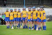 18 July 2009; The Clare team stand together during the national anthem. Gala Senior Camogie Championship, Group 2, Round 3, Clare v Limerick, Cusack Park, Ennis, Co. Clare. Picture credit: Diarmuid Greene / SPORTSFILE