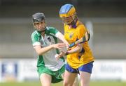 18 July 2009; Aoife Ryan, Clare, in action against Judith Mulcahy, Limerick. Gala Senior Camogie Championship, Group 2, Round 3, Clare v Limerick, Cusack Park, Ennis, Co. Clare. Picture credit: Diarmuid Greene / SPORTSFILE