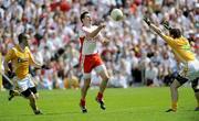 19 July 2009; Sean Cavanagh, Tyrone, in action against Kevin O'Boyle, Antrim. GAA Football Ulster Senior Championship Final, Tyrone v Antrim, St Tighearnach's Park, Clones, Co. Monaghan. Picture credit: Oliver McVeigh / SPORTSFILE