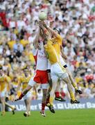 19 July 2009; Sean Cavanagh and Kevin Hughes, Tyrone, in action against Aodhan Gallagher and Michael McCann, Antrim. GAA Football Ulster Senior Championship Final, Tyrone v Antrim, St Tighearnach's Park, Clones, Co. Monaghan. Picture credit: Oliver McVeigh / SPORTSFILE