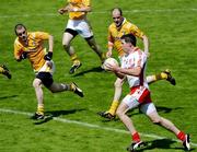 19 July 2009; Sean Cavanagh, Tyrone, in action against Andy McClean, left, and Michael McCann, Antrim. GAA Football Ulster Senior Championship Final, Tyrone v Antrim, St Tighearnach's Park, Clones, Co. Monaghan. Picture credit: Michael Cullen / SPORTSFILE