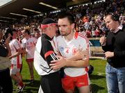 19 July 2009; Tyrone manager, Mickey Harte, and Ryan McMenamin, embrace at the final whistle. GAA Football Ulster Senior Championship Final, Tyrone v Antrim, St Tighearnach's Park, Clones, Co. Monaghan. Picture credit: Oliver McVeigh / SPORTSFILE