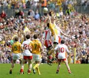 19 July 2009; Sean Cavanagh and Kevin Hughes, Tyrone, in action against Michael McCann, Antrim. GAA Football Ulster Senior Championship Final, Tyrone v Antrim, St Tighearnach's Park, Clones, Co. Monaghan. Picture credit: Oliver McVeigh / SPORTSFILE
