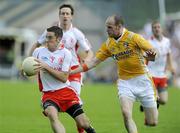 19 July 2009; Philip Jordan, Tyrone, in action against Aodhran Gallagher, Antrim. GAA Football Ulster Senior Championship Final, Tyrone v Antrim, St Tighearnach's Park, Clones, Co. Monaghan. Picture credit: Oliver McVeigh / SPORTSFILE
