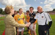 19 July 2009; President Mary McAleese shakes ands with Antrim manager Liam Bradley before the game. GAA Football Ulster Senior Championship Final, Tyrone v Antrim, St Tighearnach's Park, Clones, Co. Monaghan. Picture credit: Oliver McVeigh / SPORTSFILE