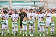 20 July 2009;  Real Madrid players, from left, Fernando Gago, Lassana Diarra, Jerzy Dudek, Gonzalo Higuain, Marcelo Vieira, and Guti with matchday mascots before the game. Soccer Friendly, Shamrock Rovers v Real Madrid, Tallaght Stadium, Dublin. Picture credit: David Maher / SPORTSFILE