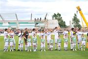 20 July 2009; Real Madrid players, from left, Cristiano Ronaldo, Fernando Gago, Lassana Diarra, Jerzy Dudek, Gonzalo Higuain, and Marcelo Vieira, Guti, Christoph Metzelder, Pepe, Miguel Torres and Raul with matchday mascots before the start of the game. Soccer Friendly, Shamrock Rovers v Real Madrid, Tallaght Stadium, Dublin. Picture credit: David Maher / SPORTSFILE
