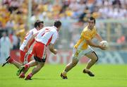19 July 2009; Kevin Niblock, Antrim, in action against Joe McMahon, left, and Philip Jordan, Tyrone. GAA Football Ulster Senior Championship Final, Tyrone v Antrim, St Tighearnach's Park, Clones, Co. Monaghan. Picture credit: Brian Lawless / SPORTSFILE
