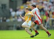 19 July 2009; Terry O'Neill, Antrim, in action against Davy Harte, Tyrone. GAA Football Ulster Senior Championship Final, Tyrone v Antrim, St Tighearnach's Park, Clones, Co. Monaghan. Picture credit: Brian Lawless / SPORTSFILE