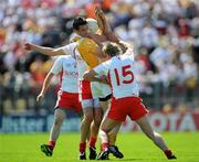 19 July 2009; Niall McKeever, Antrim, in action against Sean Cavanagh and Owen Mulligan, right, Tyrone. GAA Football Ulster Senior Championship Final, Tyrone v Antrim, St Tighearnach's Park, Clones, Co. Monaghan. Picture credit: Brian Lawless / SPORTSFILE