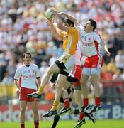 19 July 2009; Niall McKeever, Antrim, in action against Kevin Hughes and Sean Cavanagh, right, Tyrone. GAA Football Ulster Senior Championship Final, Tyrone v Antrim, St Tighearnach's Park, Clones, Co. Monaghan. Picture credit: Brian Lawless / SPORTSFILE