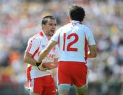 19 July 2009; Tyrone's Ryan McMenamin, left, congratulates team-mate Joe McMahon after scoring a point. GAA Football Ulster Senior Championship Final, Tyrone v Antrim, St Tighearnach's Park, Clones, Co. Monaghan. Picture credit: Brian Lawless / SPORTSFILE