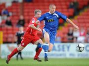 21 July 2009; Gary Alexander, Millwall, in action against Maurice Farrell, Shelbourne. Soccer Friendly, Shelbourne v Millwall, Tolka Park, Drumcondra, Dublin. Picture credit: Brian Lawless / SPORTSFILE
