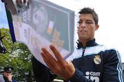 22 July 2009; Real Madrid's Cristiano Ronaldo signs autographs during the final day of their pre-season training camp at Carton House. Carton House, Maynooth, Co. Kildare. Picture credit: Matt Browne / SPORTSFILE