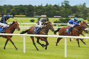 23 July 2009; Bobbyscot, 1, with Willie Supple up, on their way to winning the Irish Stallion Farms European Breeders Fund Median Auction Maiden from Majaazef, 6, with Declan McDonogh and Mark Twain with Johnny Murtagh, left. Leopardstown Racecourse, Co. Dublin. Picture credit: Matt Browne / SPORTSFILE