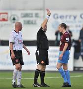24 July 2009; Referee Tom Connolly, shows the red card to Scott Gibb, Drogheda United. League of Ireland Premier Division, Dundalk v Drogheda United, Oriel Park, Dundalk, Co. Louth. Picture credit: David Maher / SPORTSFILE