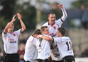 24 July 2009; Alex Williams, hidden, Dundalk, celebrates with team-mates Tiernan Mulkenna, no.7, Michael McGowan, no.11, Chris Turner, top, after scoring his side's fourth goal. League of Ireland Premier Division, Dundalk v Drogheda United, Oriel Park, Dundalk, Co. Louth. Picture credit: David Maher / SPORTSFILE