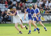 25 July 2009; Conor McMahon, Clare, in action against Diarmuid Lyng, Wexford. GAA Hurling All-Ireland Senior Championship Relegation, Round 1, Clare v Wexford, O'Moore Park, Portlaoise, Co. Laois. Picture credit: Matt Browne / SPORTSFILE