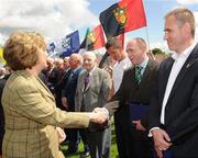 19 July 2009; President Mary McAleese and Ulster GAA President Tom Daly meet Henry Downey before the GAA Football Ulster Senior Championship Final, Tyrone v Antrim, St Tighearnach's Park, Clones, Co. Monaghan. Picture credit: Oliver McVeigh / SPORTSFILE