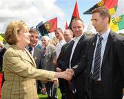 19 July 2009; President Mary McAleese and Ulster GAA President Tom Daly meet Paul McGrane before the GAA Football Ulster Senior Championship Final, Tyrone v Antrim, St Tighearnach's Park, Clones, Co. Monaghan. Picture credit: Oliver McVeigh / SPORTSFILE