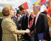 19 July 2009; President Mary McAleese and Ulster GAA President Tom Daly meet Brian McEniff before the GAA Football Ulster Senior Championship Final, Tyrone v Antrim, St Tighearnach's Park, Clones, Co. Monaghan. Picture credit: Oliver McVeigh / SPORTSFILE