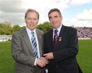 19 July 2009; Tyrone 1984 Jubilee Team member Donal Donnelly receives a presentation from Ulster GAA President Tom Daly, right, at half time in the GAA Football Ulster Senior Championship Final, Tyrone v Antrim, St Tighearnach's Park, Clones, Co. Monaghan. Picture credit: Oliver McVeigh / SPORTSFILE