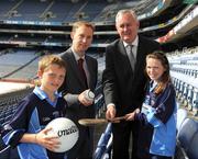 24 July 2009; Dara O'Shea, age 10, from Tempelogue, Dublin, and Sadhbh Ni Mhaoilmhichil, age 11, from Crumlin, Dublin, with Uachtarán Chumann Lúthchleas Gael Criostóir Ó Cuana who unveiled the Association's Codes of Best Practice in Youth and Sport Behaviour in the company of the Minister for Children and Youth Affairs Barry Andrews T.D. in Croke Park, Dublin. Picture credit: Ray McManus / SPORTSFILE