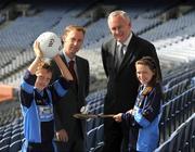 24 July 2009; Dara O'Shea, age 10, from Tempelogue, Dublin, and Sadhbh Ni Mhaoilmhichil, age 11, from Crumlin, Dublin, with Uachtarán Chumann Lúthchleas Gael Criostóir Ó Cuana who unveiled the Association's Codes of Best Practice in Youth and Sport Behaviour in the company of the Minister for Children and Youth Affairs Barry Andrews T.D. in Croke Park, Dublin. Picture credit: Ray McManus / SPORTSFILE