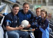 24 July 2009; Donncha O Maoilmhichil, age 10, and  Sadhbh Ni Mhaoilmhichil, age 11, both from Crumlin, Duublin, with Dublin stars Paddy Andrews and Conal Keaney at the launch of the GAA's Codes of Best Practice in Youth and Sport Behaviour in Croke Park, Dublin. Picture credit: Ray McManus / SPORTSFILE