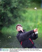 July 1997; Padraig Harrington playing from the water at the 13th green during the Murphy's Irish Open at Druid's Glen. Golf. Picture credit; David Maher/SPORTSFILE