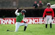 22 April 1997; Jockey Basil Valentine shows his frustration after falling from The Executrix at the last fence during the Kildare Chilling Hunters Steeplechase on Day 1 of the Punchestown Festival at Punchestown Racecourse in Kildare. Photo by David Maher/Sportsfile