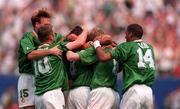 18 June 1994; Ray Houghton of Republic of Ireland celebrates after scoring his side's first goal with team-mates, from left, Tommy Coyne, John Sheridan, Steve Staunton and Phil Babb, during the FIFA World Cup 1994 Group E match between Republic of Ireland and Italy at Giants Stadium in New Jersey, USA. Photo by Ray McManus/Sportsfile