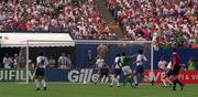 18 June 1994; Ray Houghton of Republic of Ireland shoots to score his side's first goal during the FIFA World Cup 1994 Group E match between Republic of Ireland and Italy at Giants Stadium in New Jersey, USA. Photo by David Maher/Sportsfile