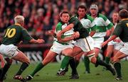 19 November 2000; Rob Henderson of Ireland is tackled by Corne Krige, centre, and Percy Montgomery, left, both of South Africa during the International rugby friendly match between Ireland and South Africa at Lansdowne Road in Dublin. Photo by Matt Browne/Sportsfile