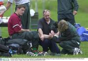 8 January 2000; Ronan O'Gara receives treatment for an ankle injury during training, from rugby team physiotherapist Denise Fanagan and massur Willie Bennett. Toronto, Ontario, Canada. Picture credit; Matt Browne/SPORTSFILE*EDI*