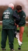 5 November 1996; Roy Keane changes his shorts   watched by team physio Mick Byrne during a Republic of Ireland Training Session at the AUL Sports Complex in Dublin. Photo by David Maher/Sportsfile